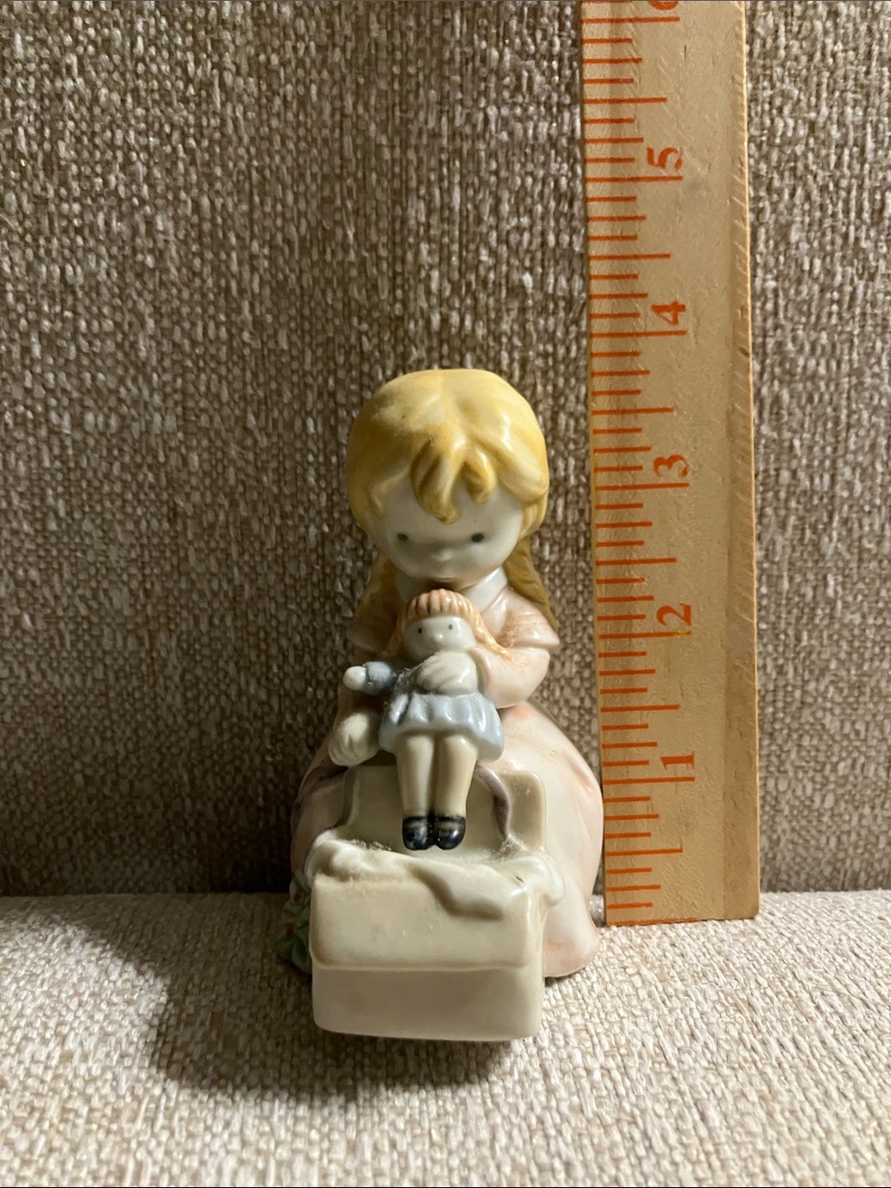 Enesco Porcelain Girl Figurine holding doll. Vintage 1990